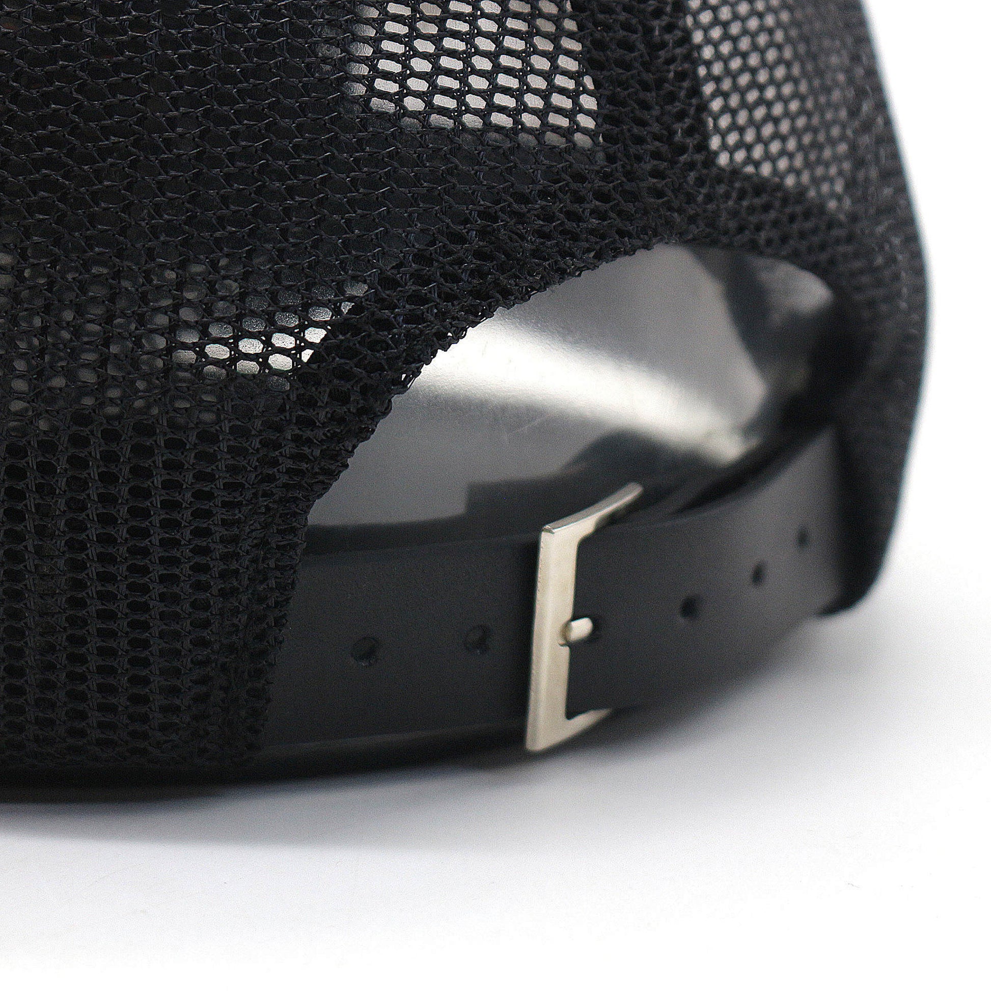 Adjustable black mesh strap at the back of the Millionaire Millennial hat with silver buckle